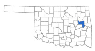 Oklahoma map highlighting Muskogee County in the central eastern part of the state.